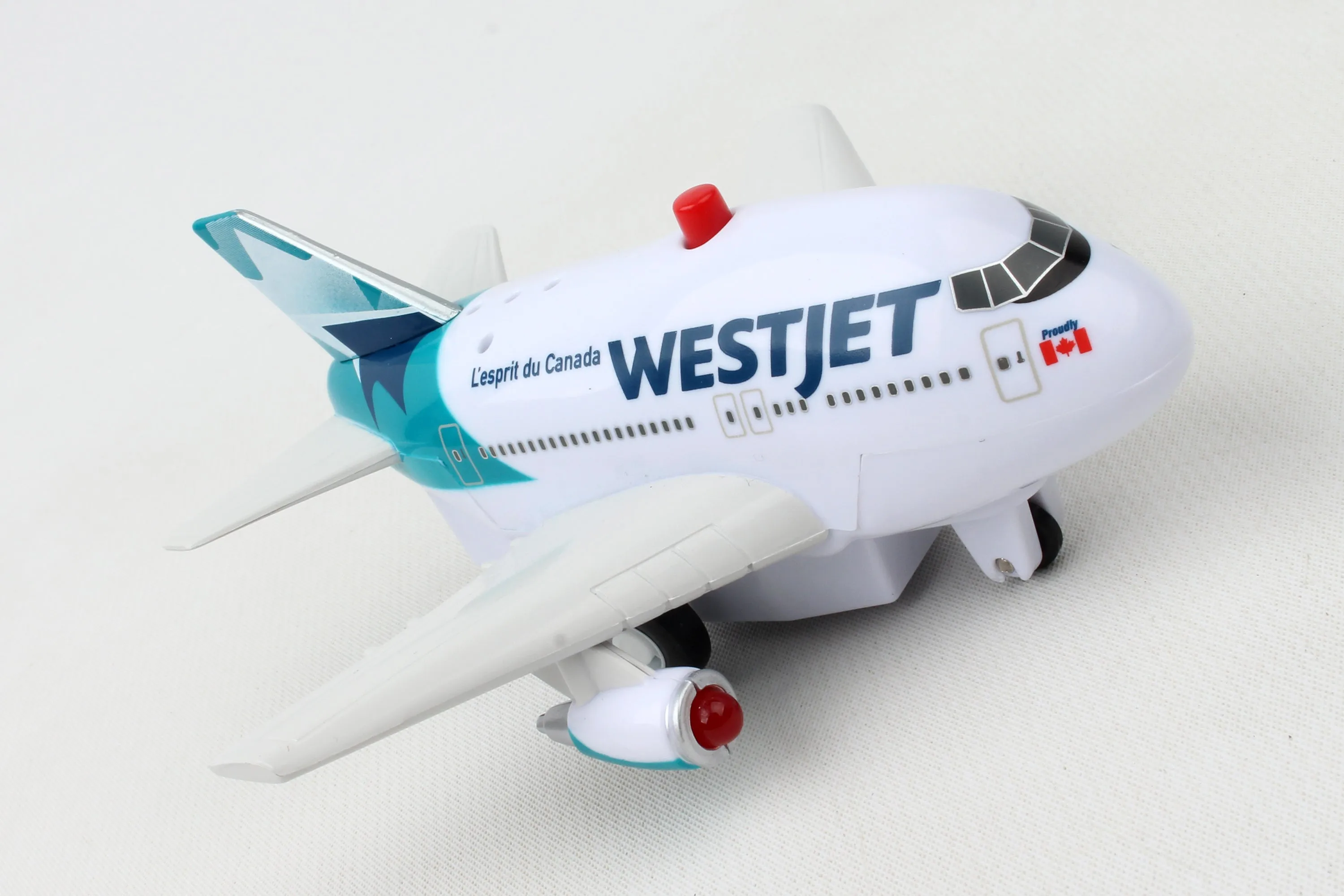 TT164-1 WESTJET PULLBACK W/LIGHT & SOUND NEW LIVERY